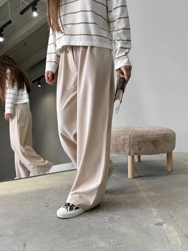 Жіночі брюки з декоративним шнурком колір бежевий 451519 451519 фото